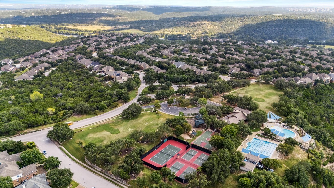 308 Calistoga Court Austin, TX 78732 - Photo 39 of 40 an aerial view of residential houses with outdoor space and lake view