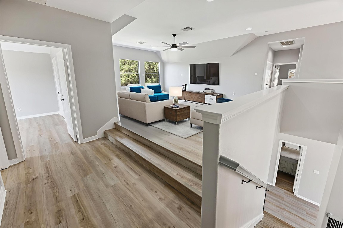 308 Calistoga Court Austin, TX 78732 - Photo 40 of 40 a living room with furniture and a flat screen tv