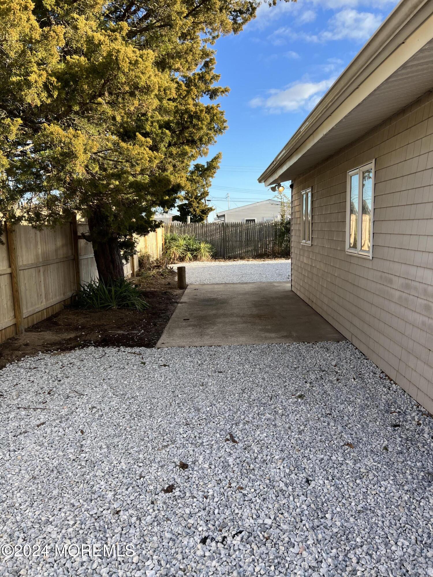 1808 Binnacle Road Forked River, NJ 08731 - Photo 24 of 27 a backyard of a house with lots of green space