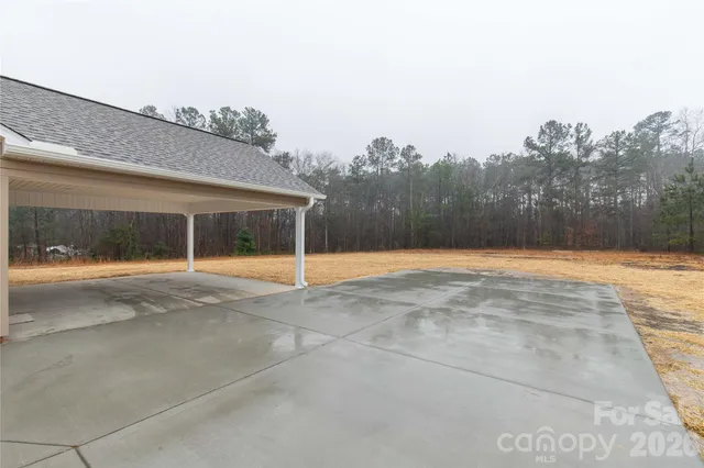 a view of house with yard