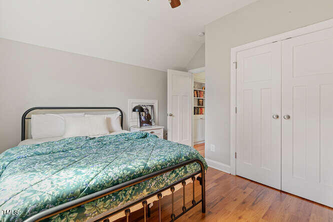 3012 Shenandoah Avenue Durham, NC 27704 - Photo 8 of 50 a bedroom with a bed and a dresser