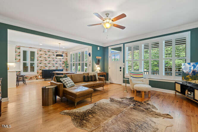 3012 Shenandoah Avenue Durham, NC 27704 - Photo 9 of 50 a living room with furniture and a large window