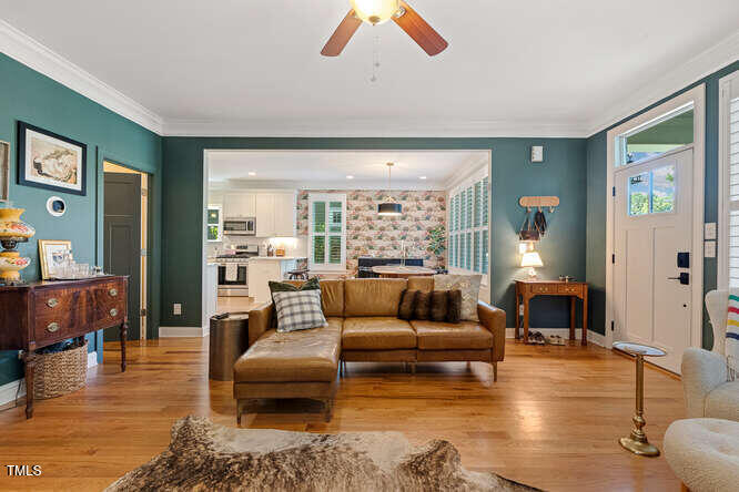 3012 Shenandoah Avenue Durham, NC 27704 - Photo 10 of 50 a living room with furniture and wooden floor