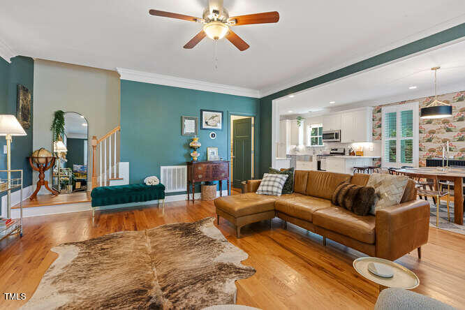 3012 Shenandoah Avenue Durham, NC 27704 - Photo 11 of 50 a living room with furniture and wooden floor