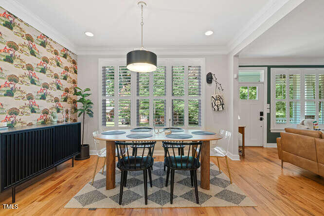 3012 Shenandoah Avenue Durham, NC 27704 - Photo 16 of 50 a view of a dining room with furniture window and outside view