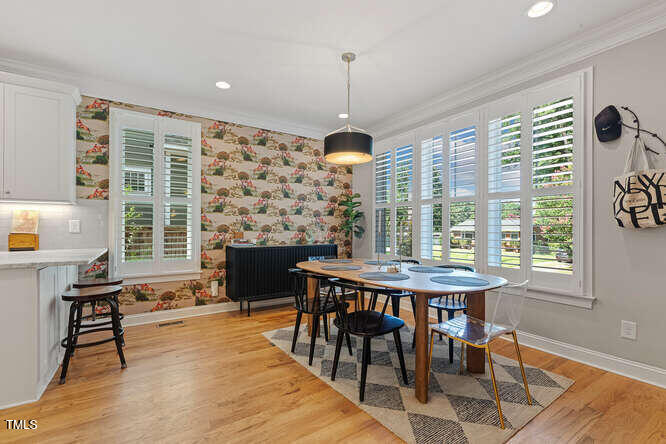 3012 Shenandoah Avenue Durham, NC 27704 - Photo 17 of 50 a view of a dining room with furniture window and outside view