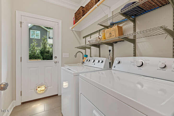 3012 Shenandoah Avenue Durham, NC 27704 - Photo 31 of 50 a utility room with dryer and washer