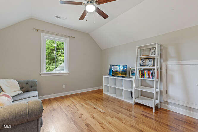 3012 Shenandoah Avenue Durham, NC 27704 - Photo 32 of 50 a living room with furniture and a wooden floor