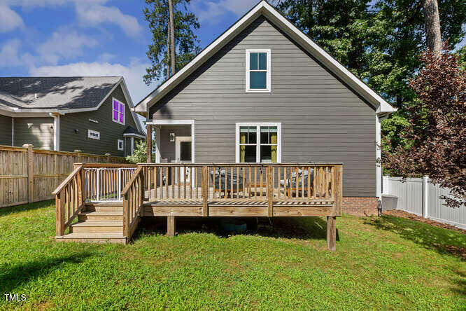 3012 Shenandoah Avenue Durham, NC 27704 - Photo 38 of 50 a view of front of house with a deck and a yard