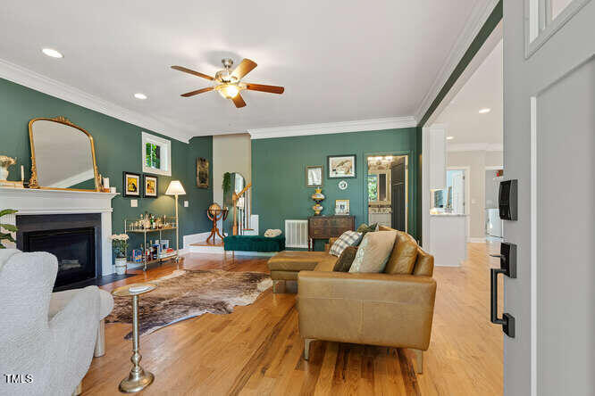 3012 Shenandoah Avenue Durham, NC 27704 - Photo 5 of 50 a living room with fireplace furniture and a large window