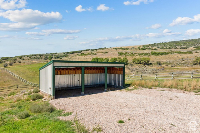 6117 North Rocky Ridge Road Peoa, UT 84061 - Photo 76 of 83 View of outbuilding featuring a rural view