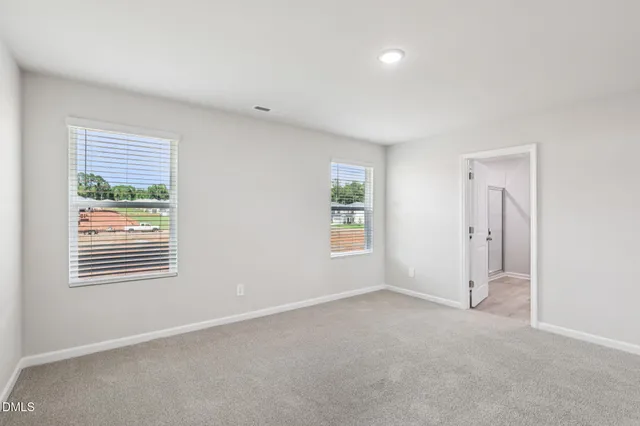 a bathroom with a sink a mirror and a vanity