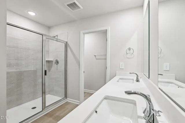 a view of an empty room and a window