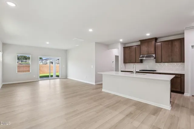 a view of a hallway with front door
