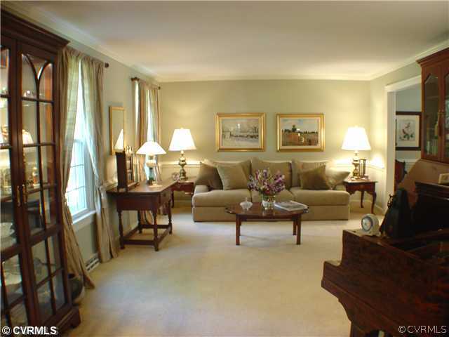 13901 Elmstead Road Midlothian, VA 23113 - Photo 2 of 12 a living room with furniture and a flat screen tv