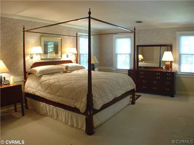 13901 Elmstead Road Midlothian, VA 23113 - Photo 8 of 12 a bedroom with a bed mirror and window