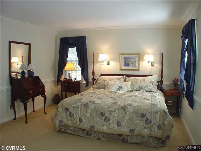 13901 Elmstead Road Midlothian, VA 23113 - Photo 10 of 12 a bed room with a bed and a chair