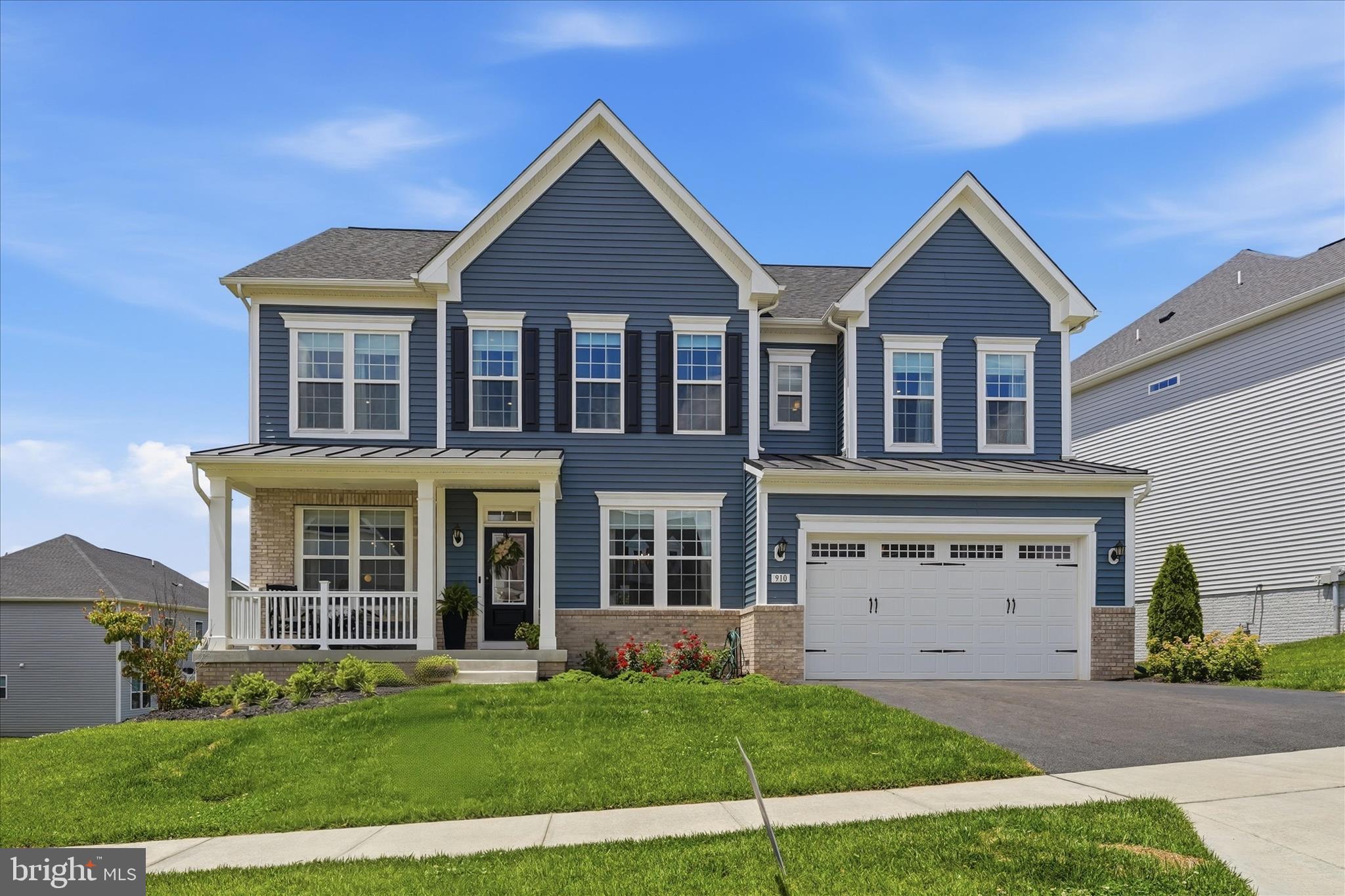 910 Enfield Farm Lane Brunswick, MD 21716 - Photo 1 of 87 front view of a house with a yard