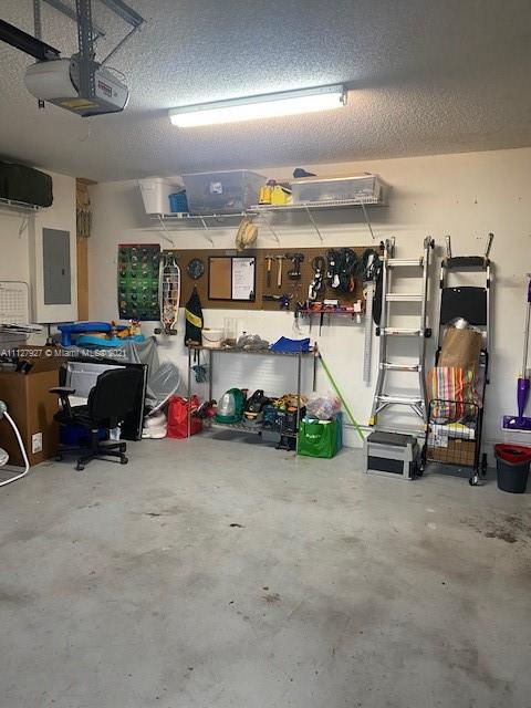 9475 Southwest 154th Court Miami, FL 33196 - Photo 27 of 27 a view of a garage with gym equipment