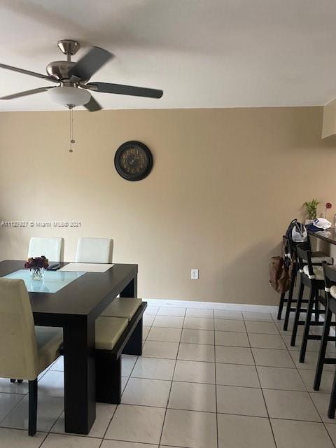 9475 Southwest 154th Court Miami, FL 33196 - Photo 6 of 27 a room with a table and chairs