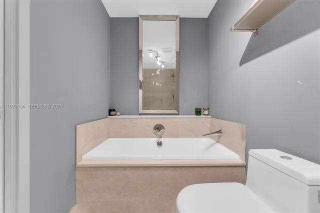 a bathroom with a sink and a toilet