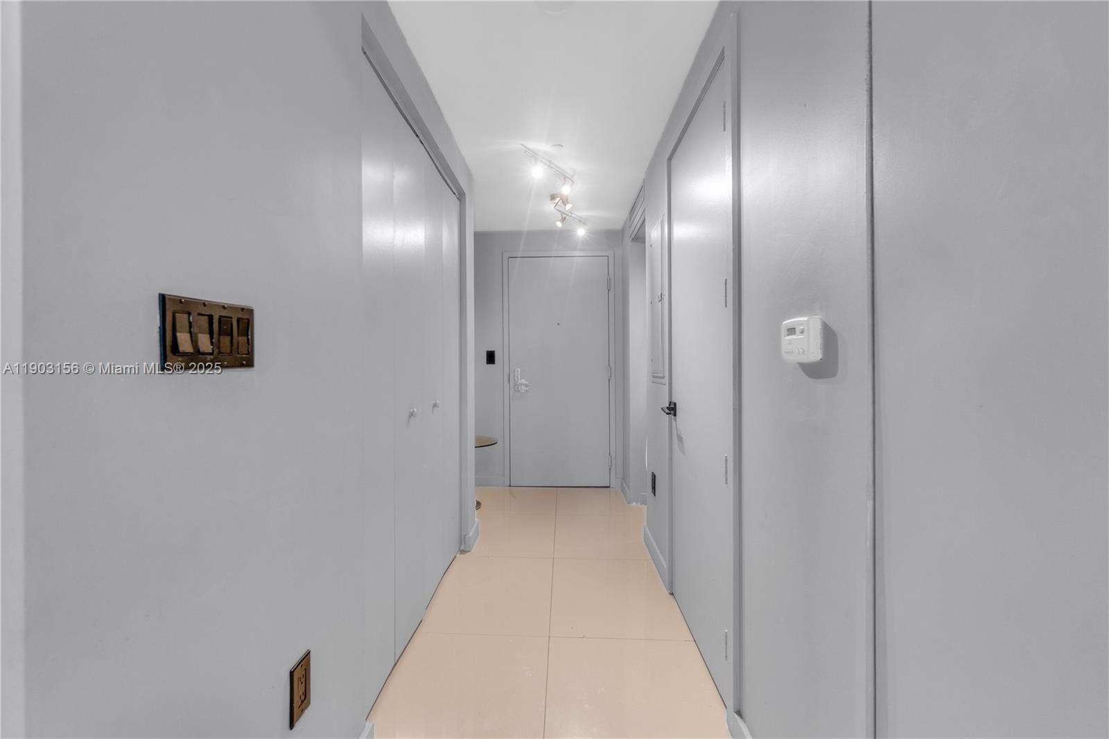 488 Northeast 18th Street, Unit 2104 Miami, FL 33132 - Photo 17 of 44 a view of a hallway