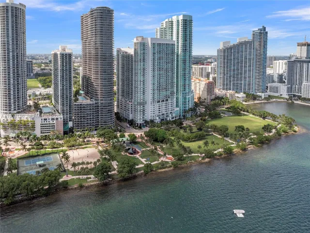 a view of a city with tall buildings