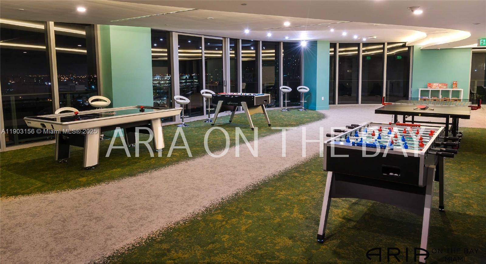 488 Northeast 18th Street, Unit 2104 Miami, FL 33132 - Photo 37 of 44 a view of a patio with table and chairs with plants and wooden fence