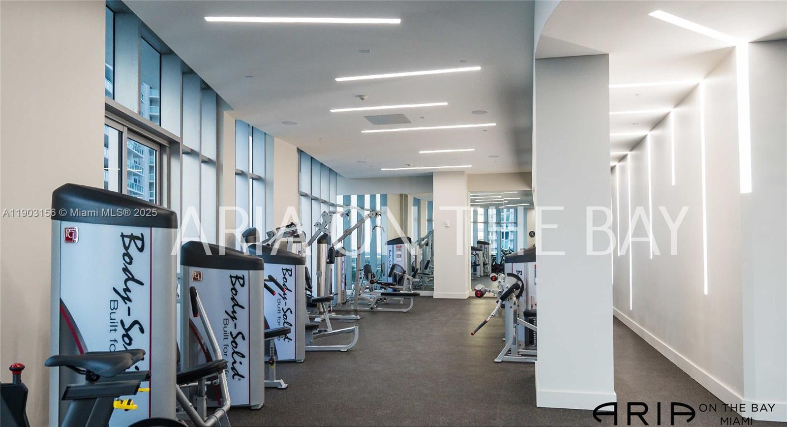 488 Northeast 18th Street, Unit 2104 Miami, FL 33132 - Photo 39 of 44 a view of a room with gym equipment