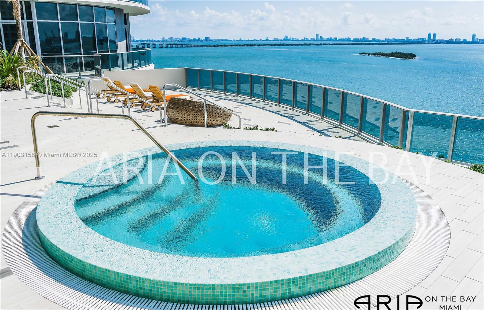 488 Northeast 18th Street, Unit 2104 Miami, FL 33132 - Photo 42 of 44 a view of a swimming pool with a yard