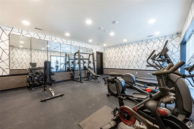 a view of a room with gym equipment
