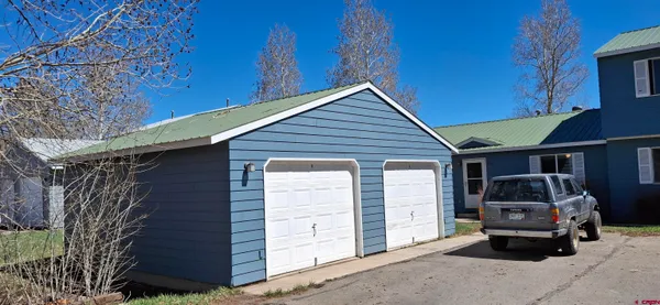 a view of a car in front of house