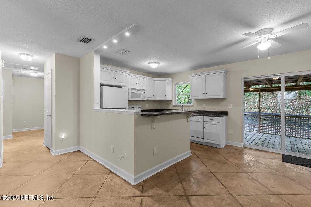 8223 Hardwood Landing Road St. Augustine, FL 32092 - Photo 12 of 36 Dining to Kitchen