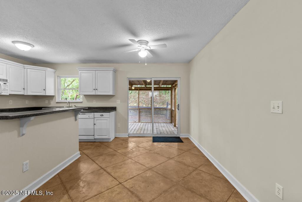 8223 Hardwood Landing Road St. Augustine, FL 32092 - Photo 18 of 36 Dining To Porch