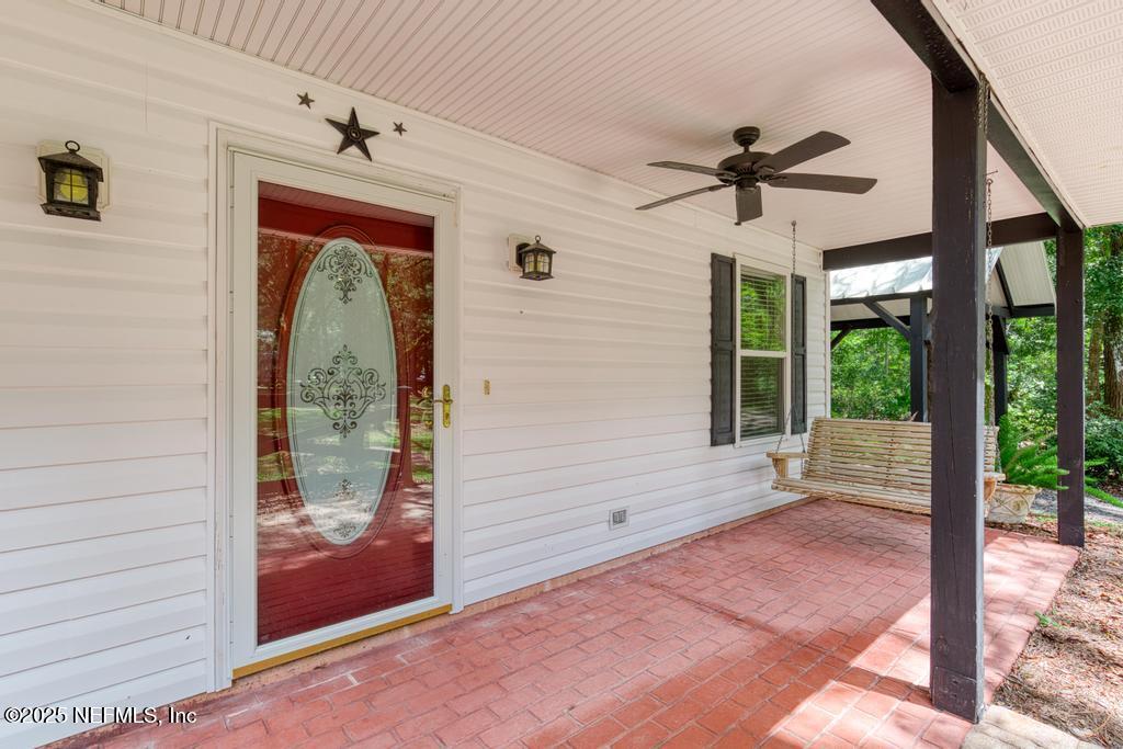 8223 Hardwood Landing Road St. Augustine, FL 32092 - Photo 5 of 36 Porch 2 Rental
