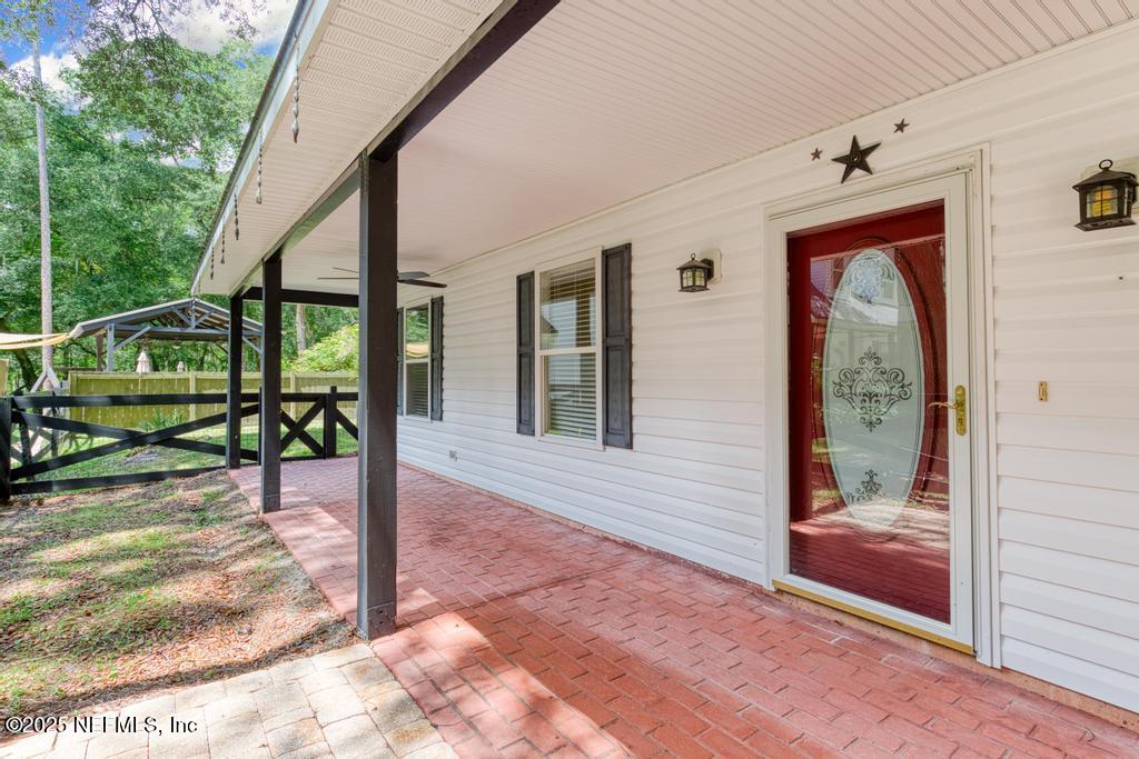 8223 Hardwood Landing Road St. Augustine, FL 32092 - Photo 6 of 36 Porch 3 Rental