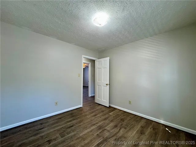 a bathroom with a sink a mirror and a shower