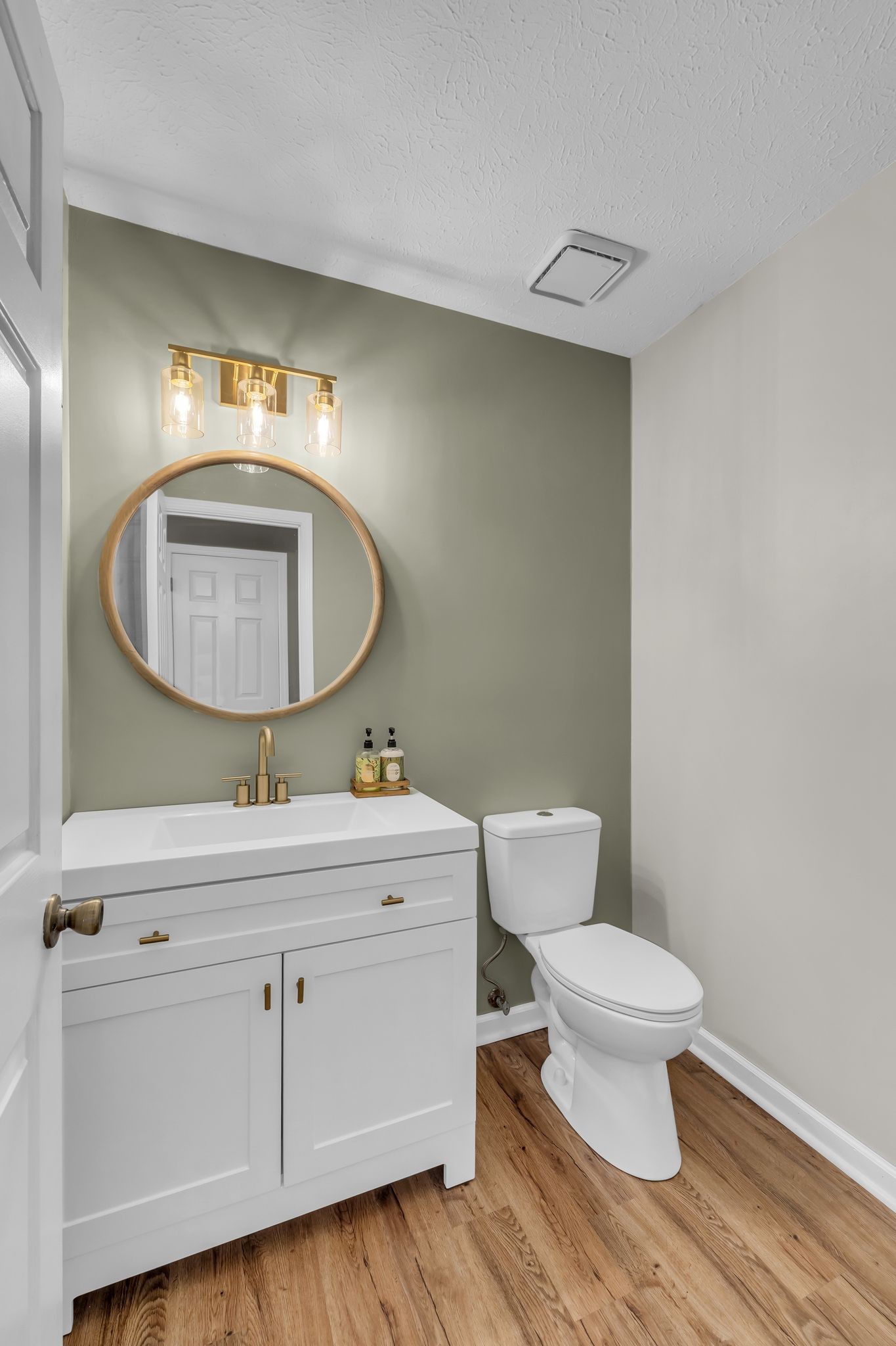 260 Pleasant Run Road Smyrna, TN 37167 - Photo 13 of 35 a bathroom with a toilet a sink and mirror