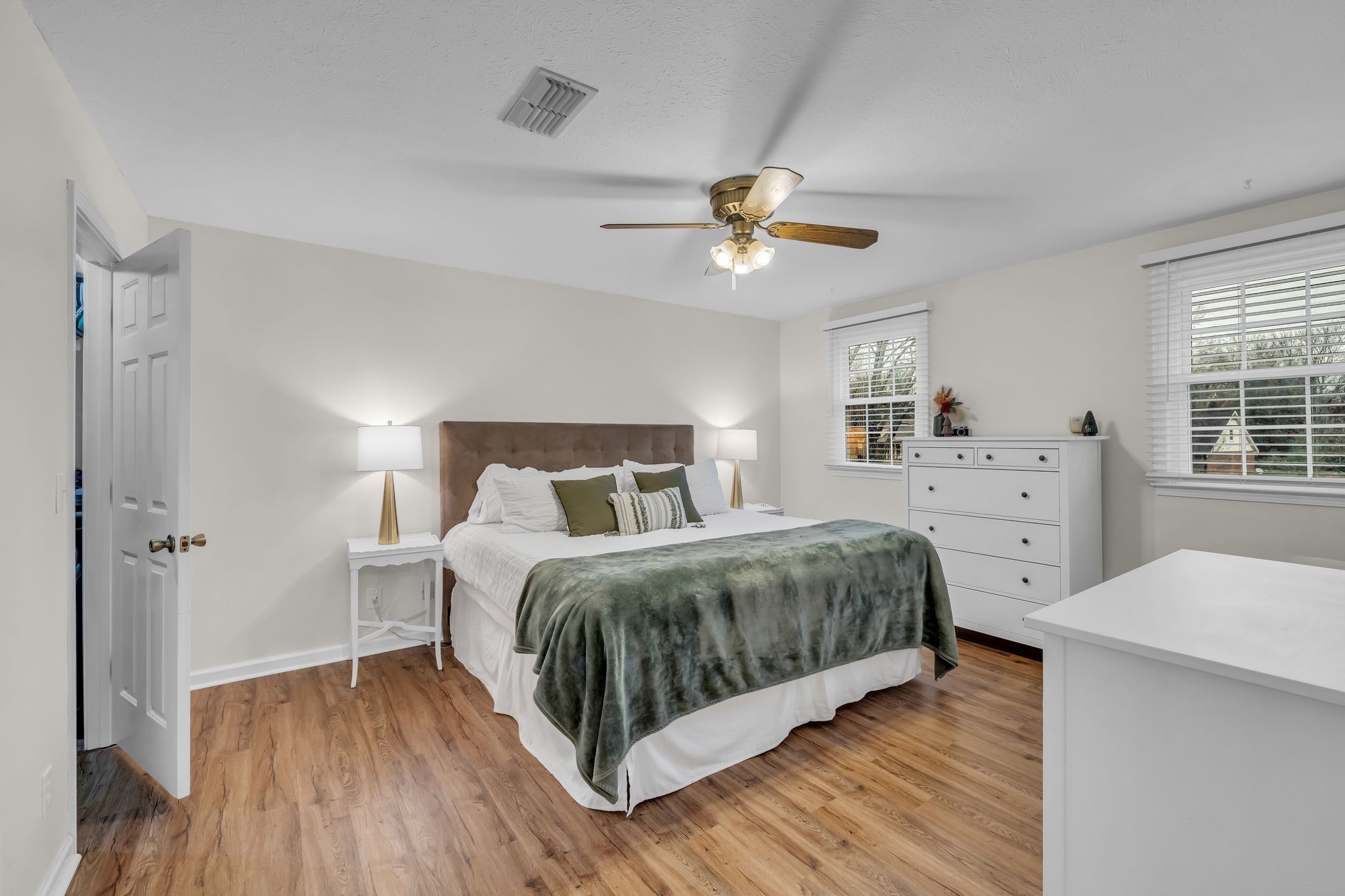 260 Pleasant Run Road Smyrna, TN 37167 - Photo 15 of 35 a spacious bedroom with a bed and a ceiling fan