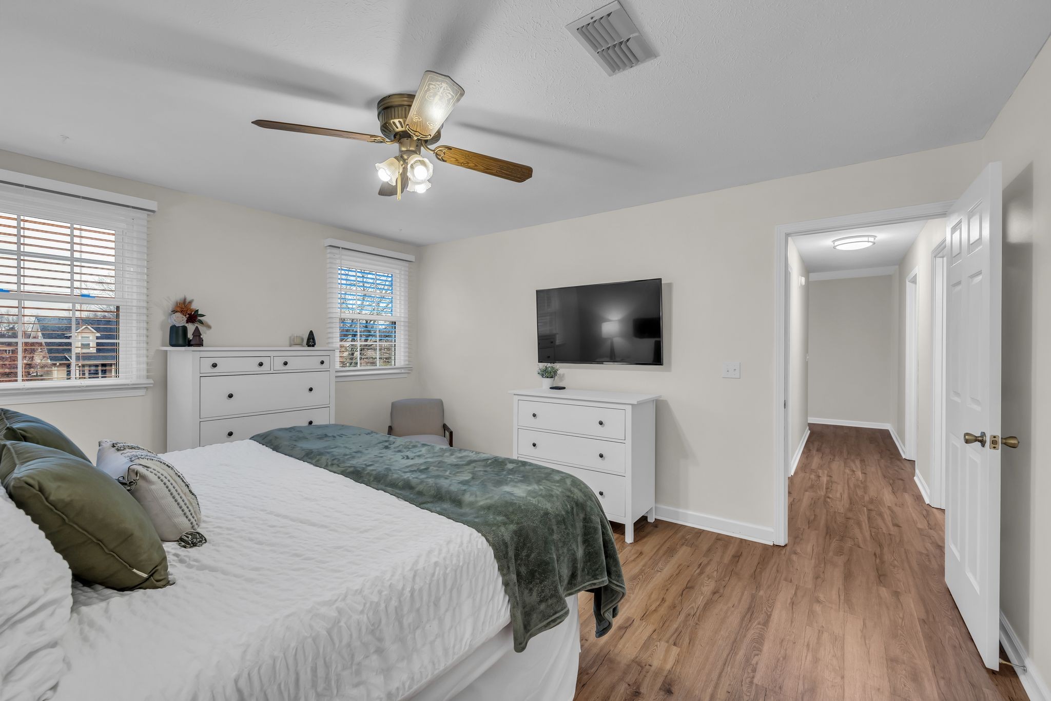 260 Pleasant Run Road Smyrna, TN 37167 - Photo 17 of 35 a bedroom with a bed and a flat tv screen on dresser