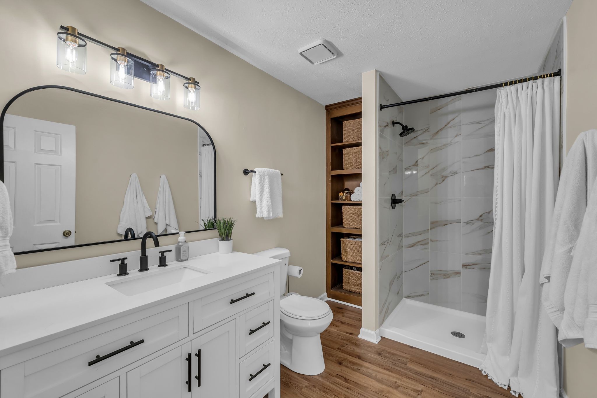260 Pleasant Run Road Smyrna, TN 37167 - Photo 19 of 35 a bathroom with a double vanity sink mirror and shower