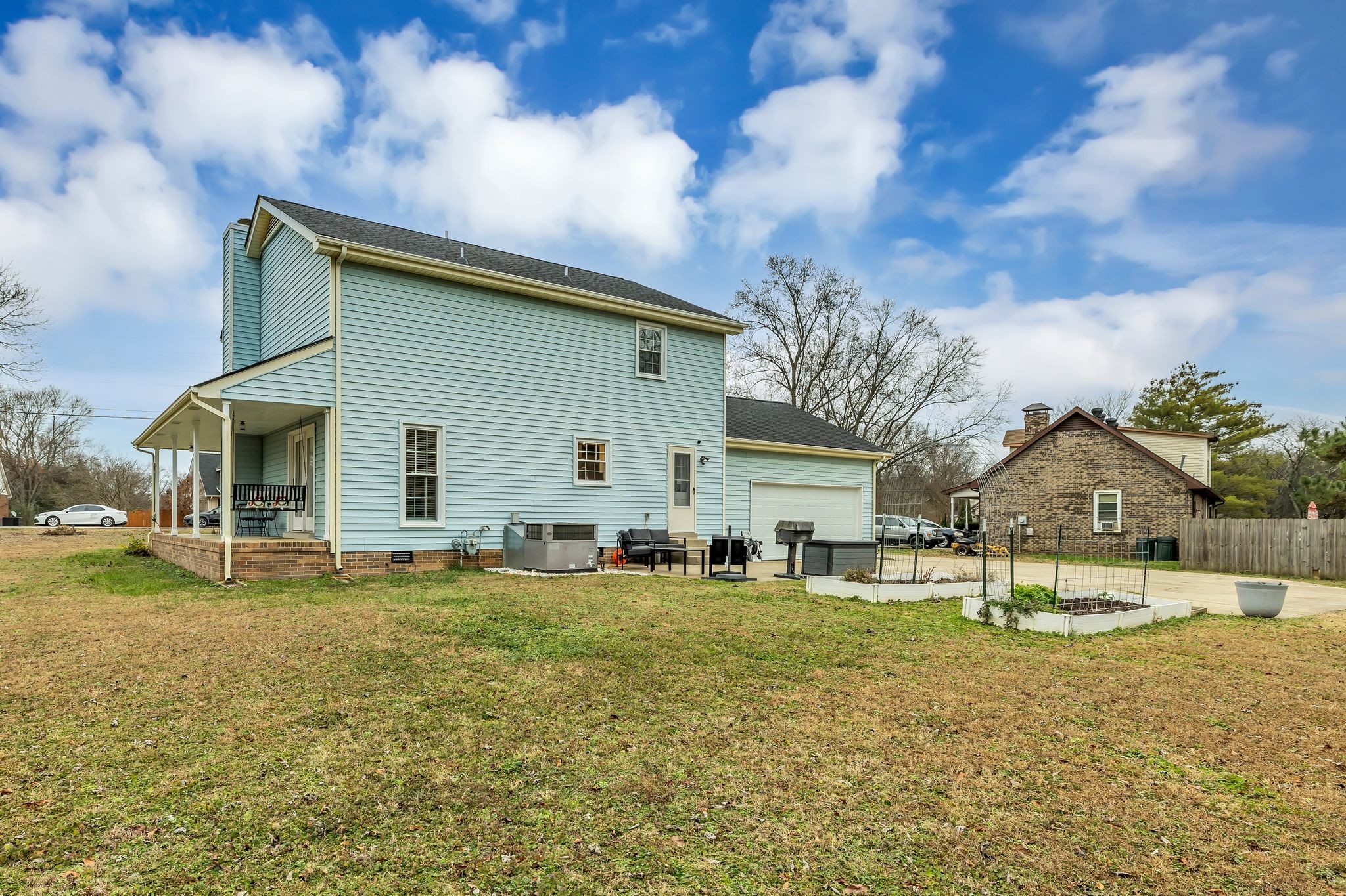 260 Pleasant Run Road Smyrna, TN 37167 - Photo 29 of 35 a backyard of a house with barbeque oven and trees
