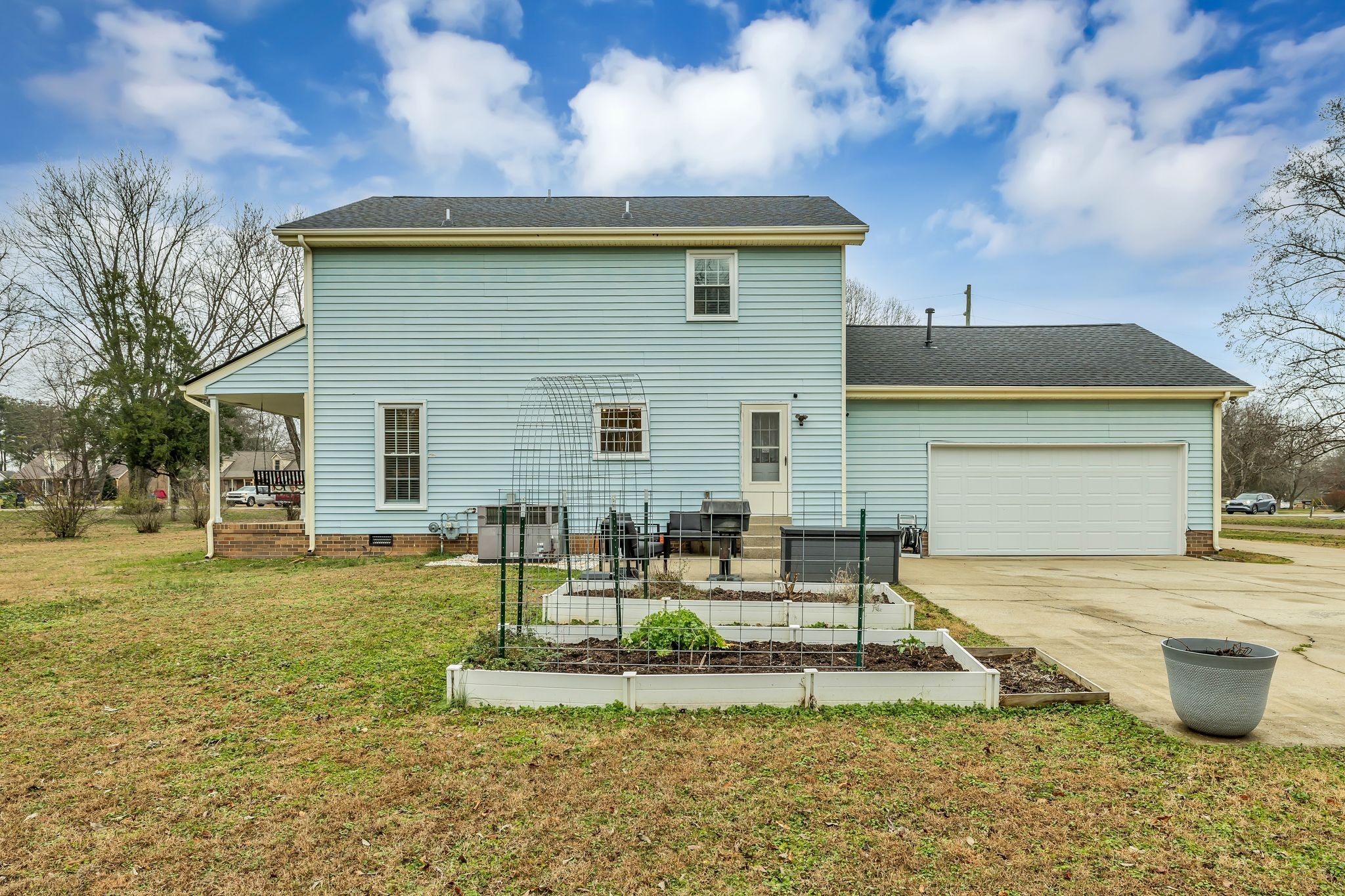 260 Pleasant Run Road Smyrna, TN 37167 - Photo 30 of 35 a view of a house with backyard and sitting area