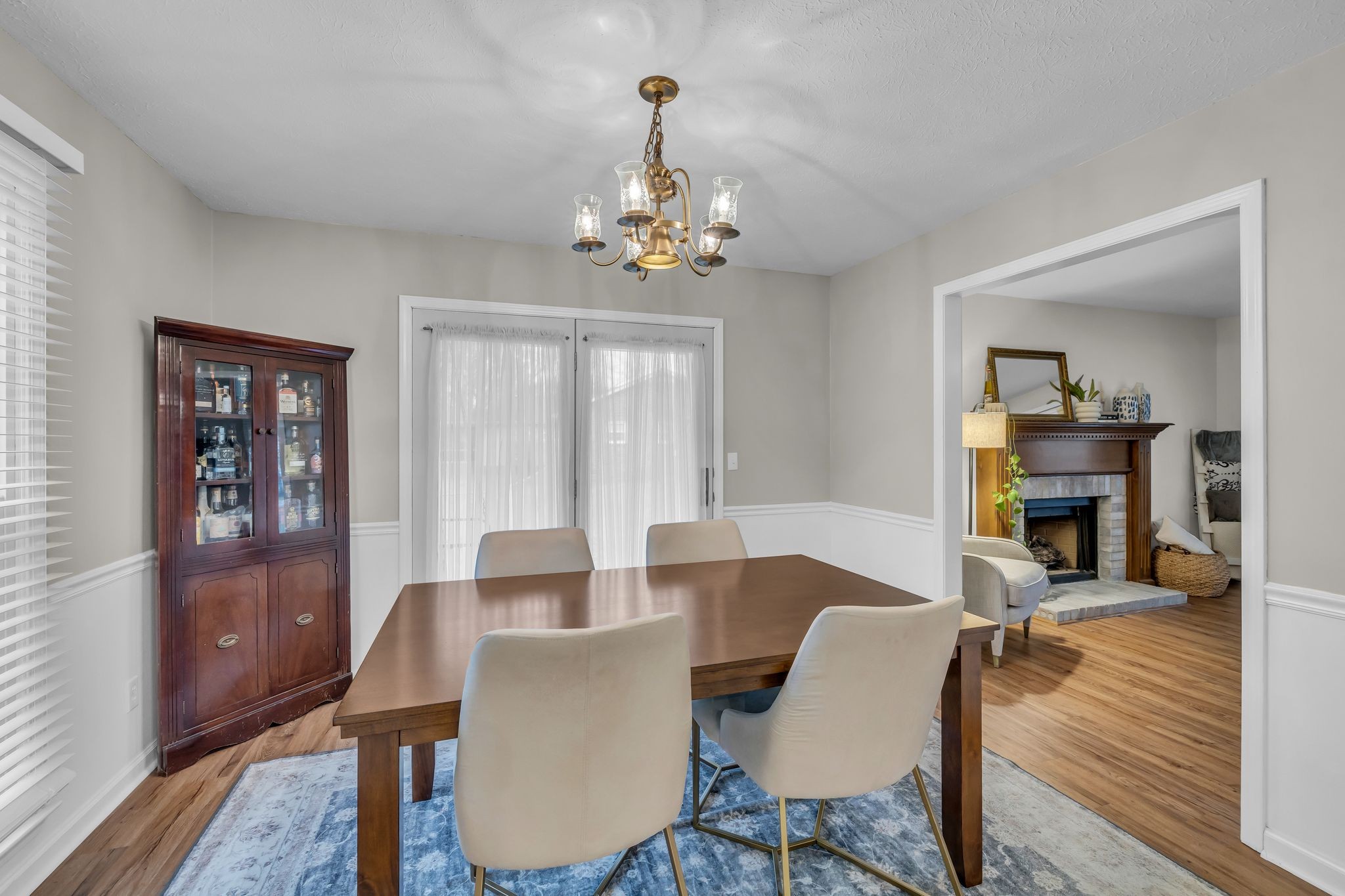 260 Pleasant Run Road Smyrna, TN 37167 - Photo 8 of 35 a view of a dining room with furniture a chandelier and wooden floor