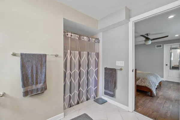 a view of bedroom with furniture and entryway