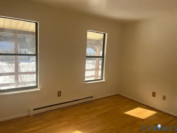 a view of an empty room and window