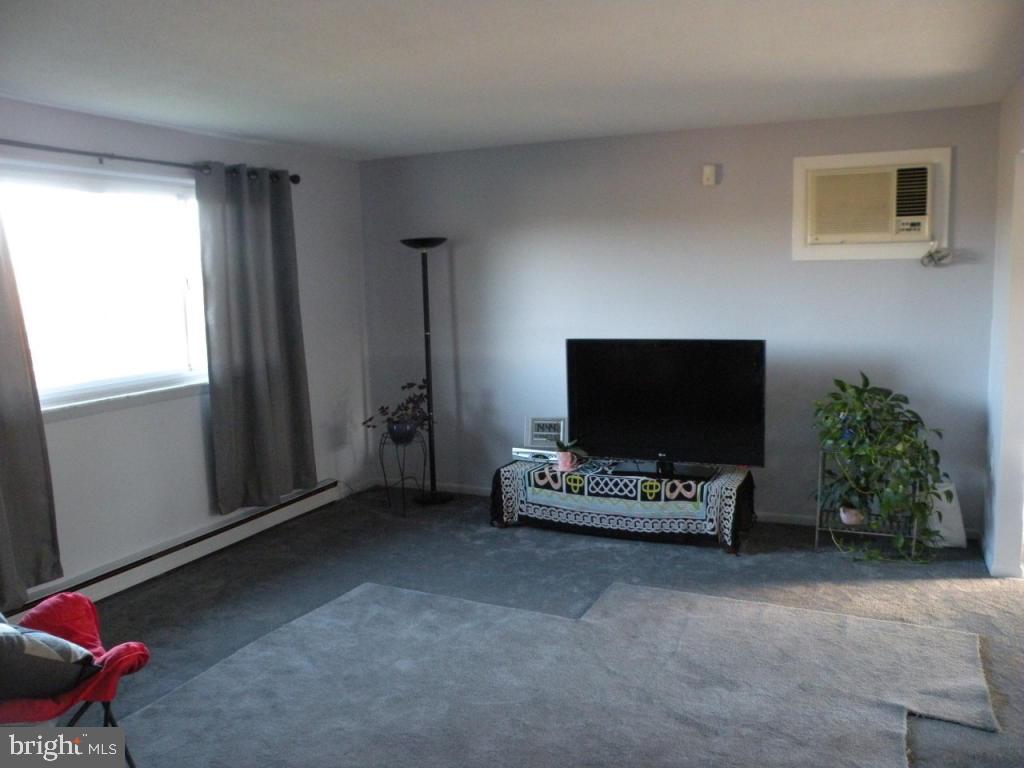 236 Zartman Mill Road Lititz, PA 17543 - Photo 12 of 22 a living room with furniture and a flat screen tv