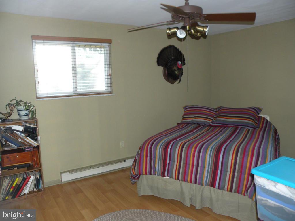 236 Zartman Mill Road Lititz, PA 17543 - Photo 14 of 22 a bedroom with a bed and cabinets