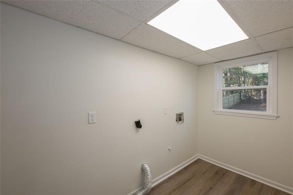 5081 Hubert Drive Powder Springs, GA 30127 - Photo 12 of 32 a view of small space with wooden floor and a window