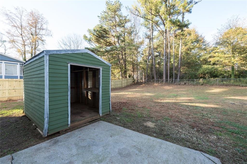 5081 Hubert Drive Powder Springs, GA 30127 - Photo 13 of 32 a view of a house with backyard